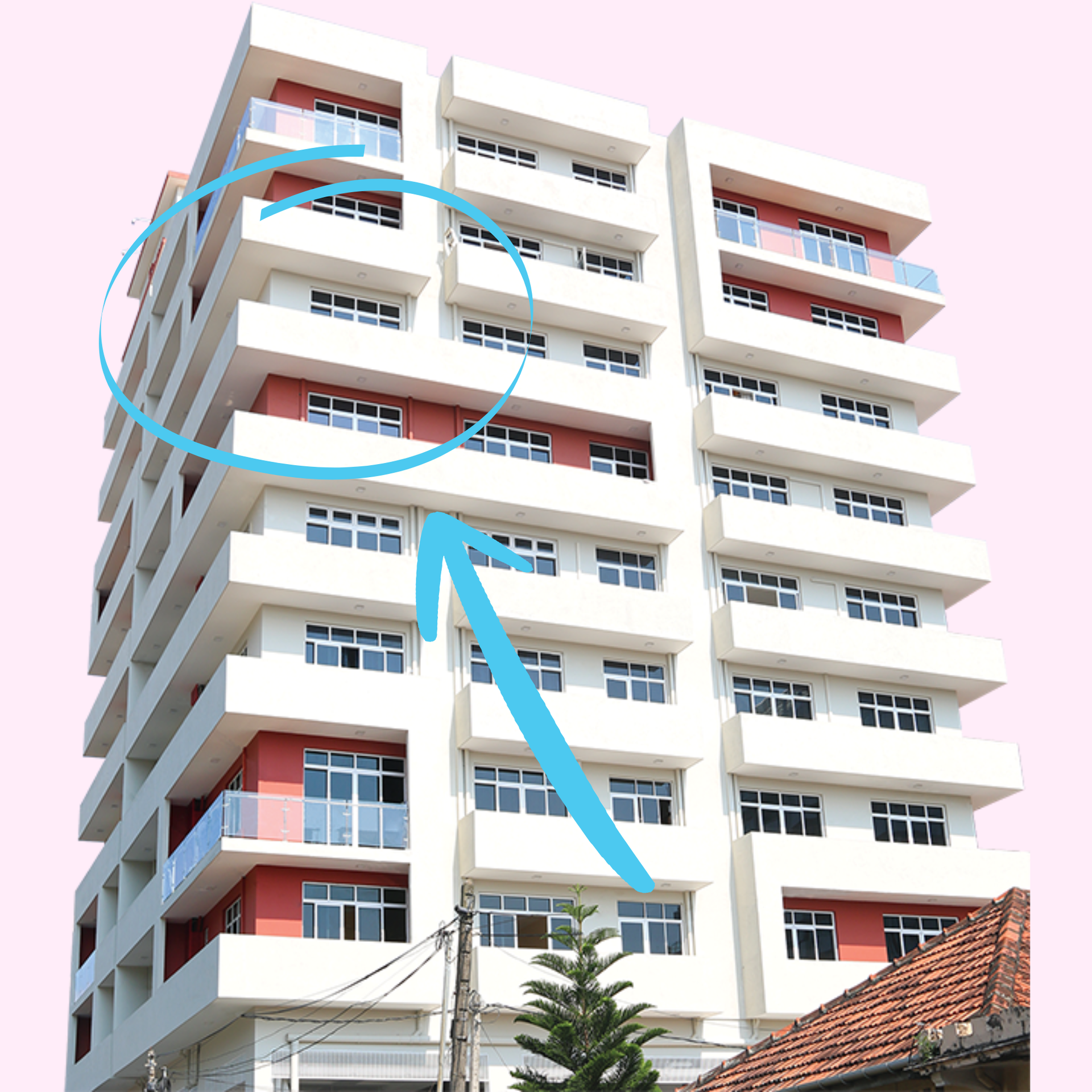 Multi-story white apartment building with blue balconies, highlighted by a blue circle and arrow.