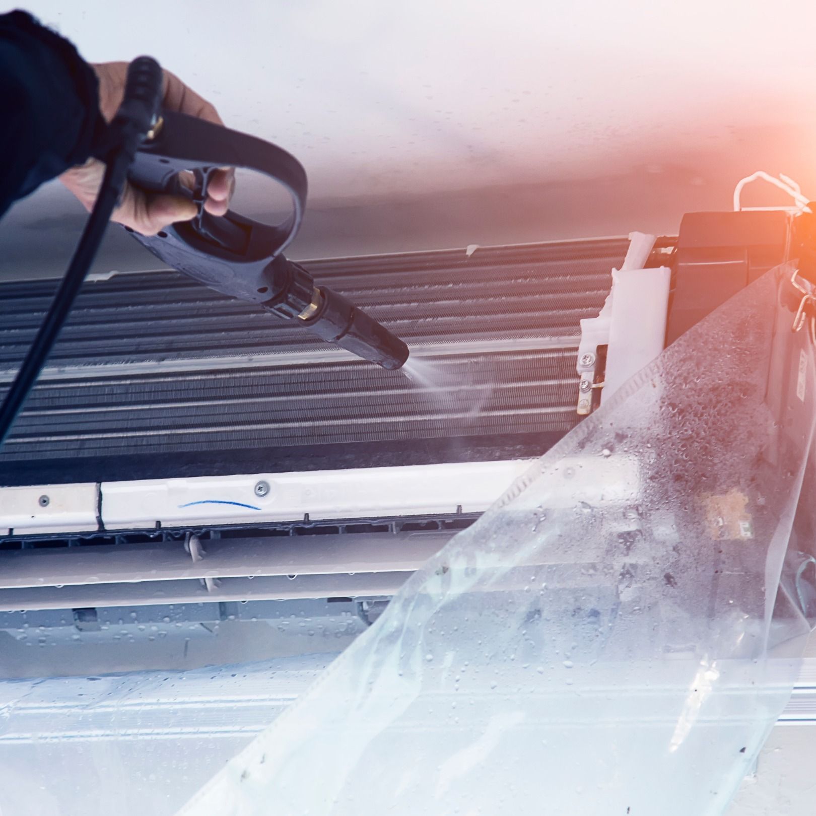 Cleaning an air conditioning unit — Revive Air Conditioning in Campbelltown, NSW