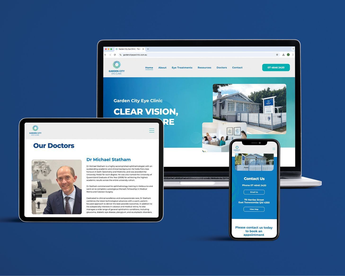 Responsive website mockup on laptop, tablet, and phone with blue-and-white homepage design