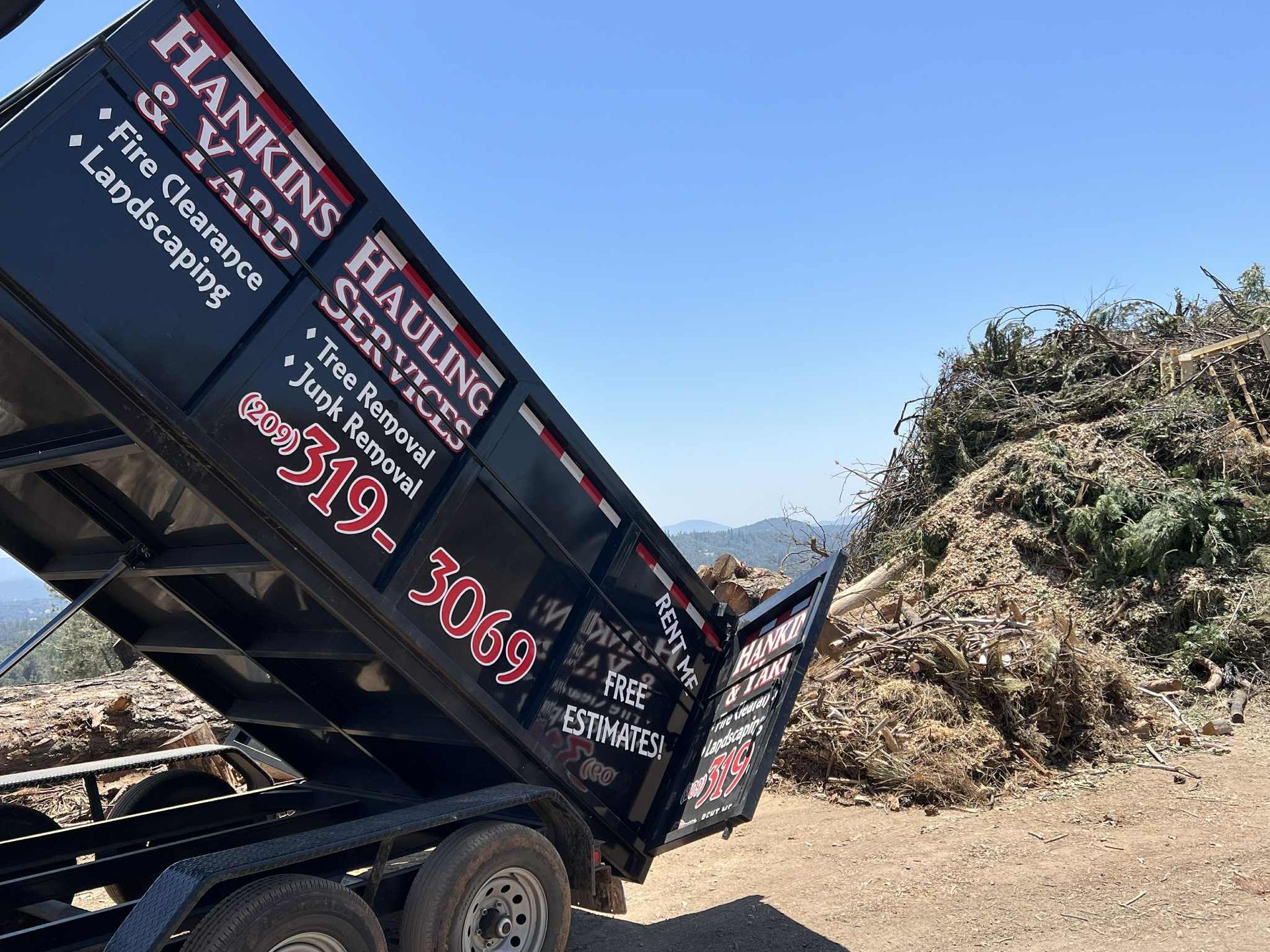 Black trailer labeled 