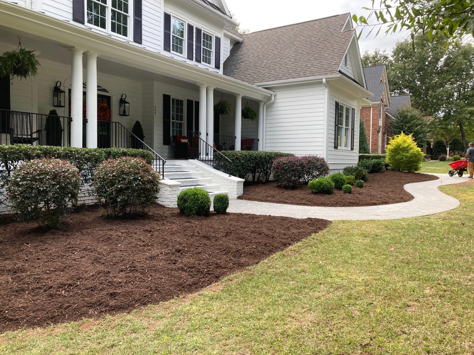 Mulch installation from Triangle Mulch and Sod