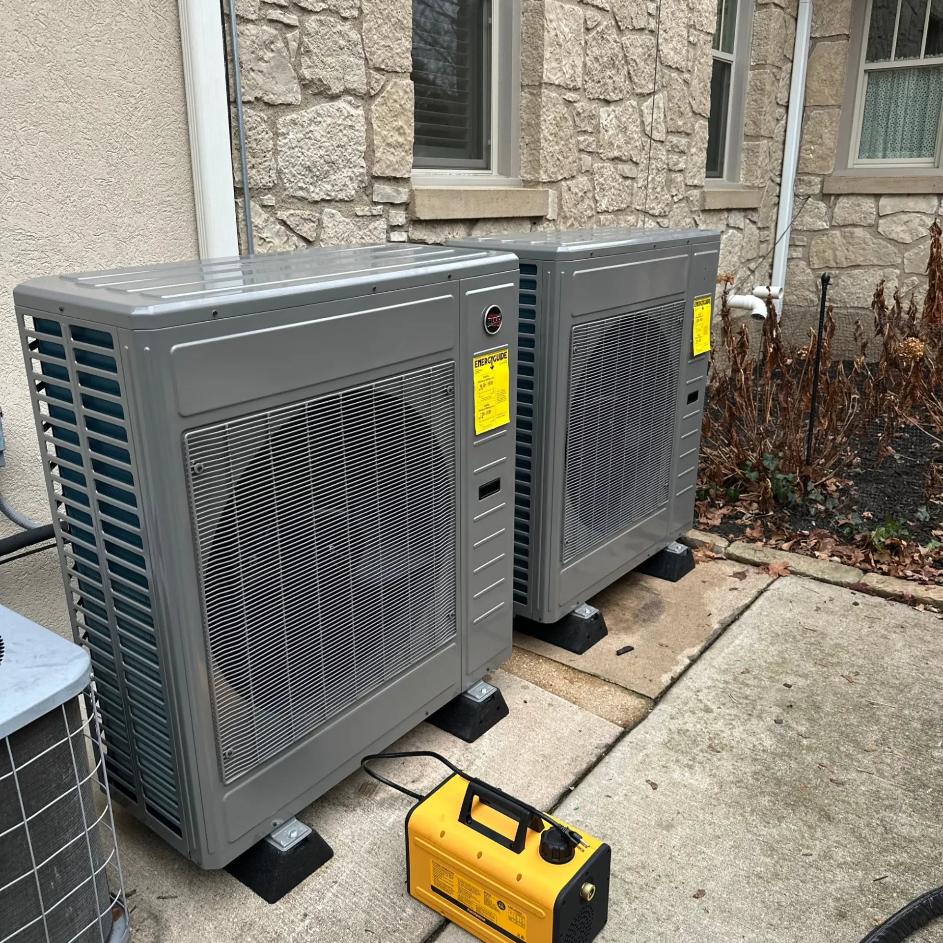 Climate Crew Heating Cooling LLC - A close up of a fan with a warning label on it