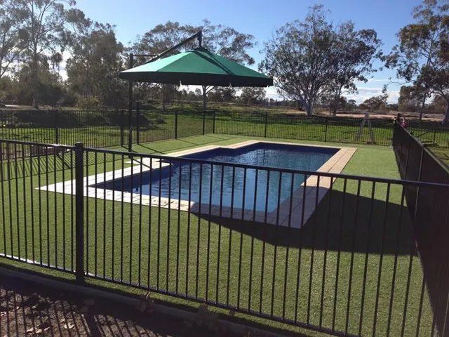 Black Fence Around the Pool — Pool Fencing in Dubbo NSW
