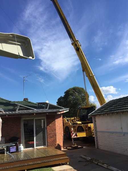 Delivering a Pool vi Crane — Pool and Landscaping in Dubbo, NSW