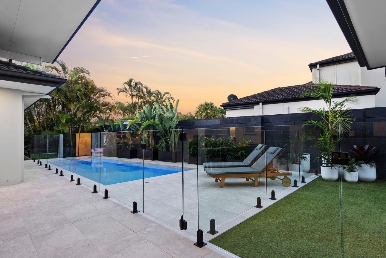 Full Frameless Glass Pool Fencing with Black Spigots