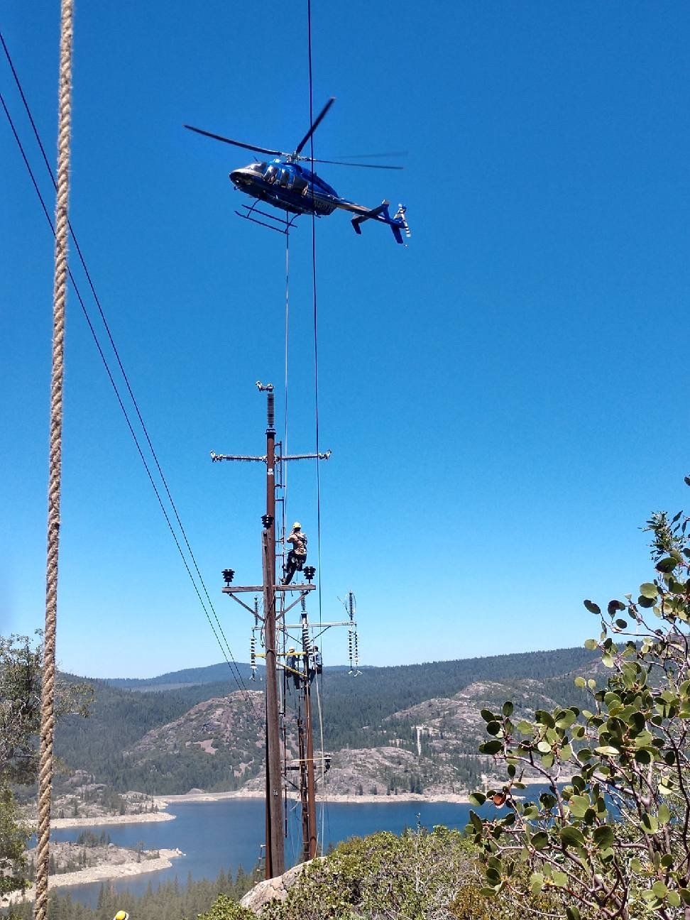 Lineman Inspecting Power Line — Sacramento, CA — Sacramento Executive Helicopters