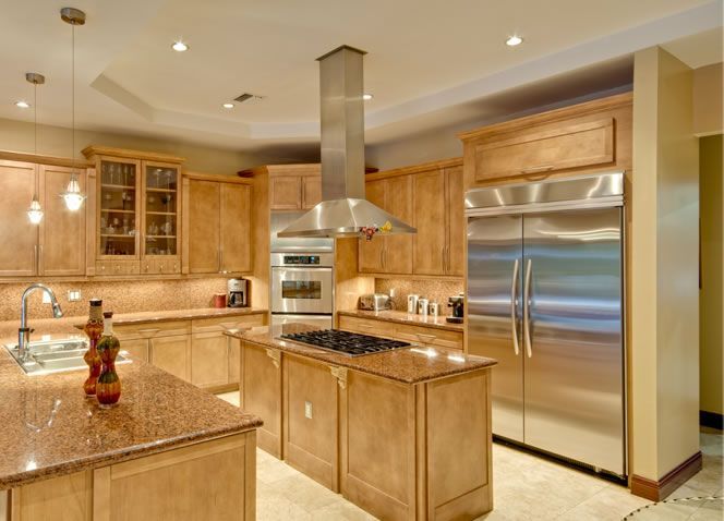 A person is writing on a piece of paper with a pen.