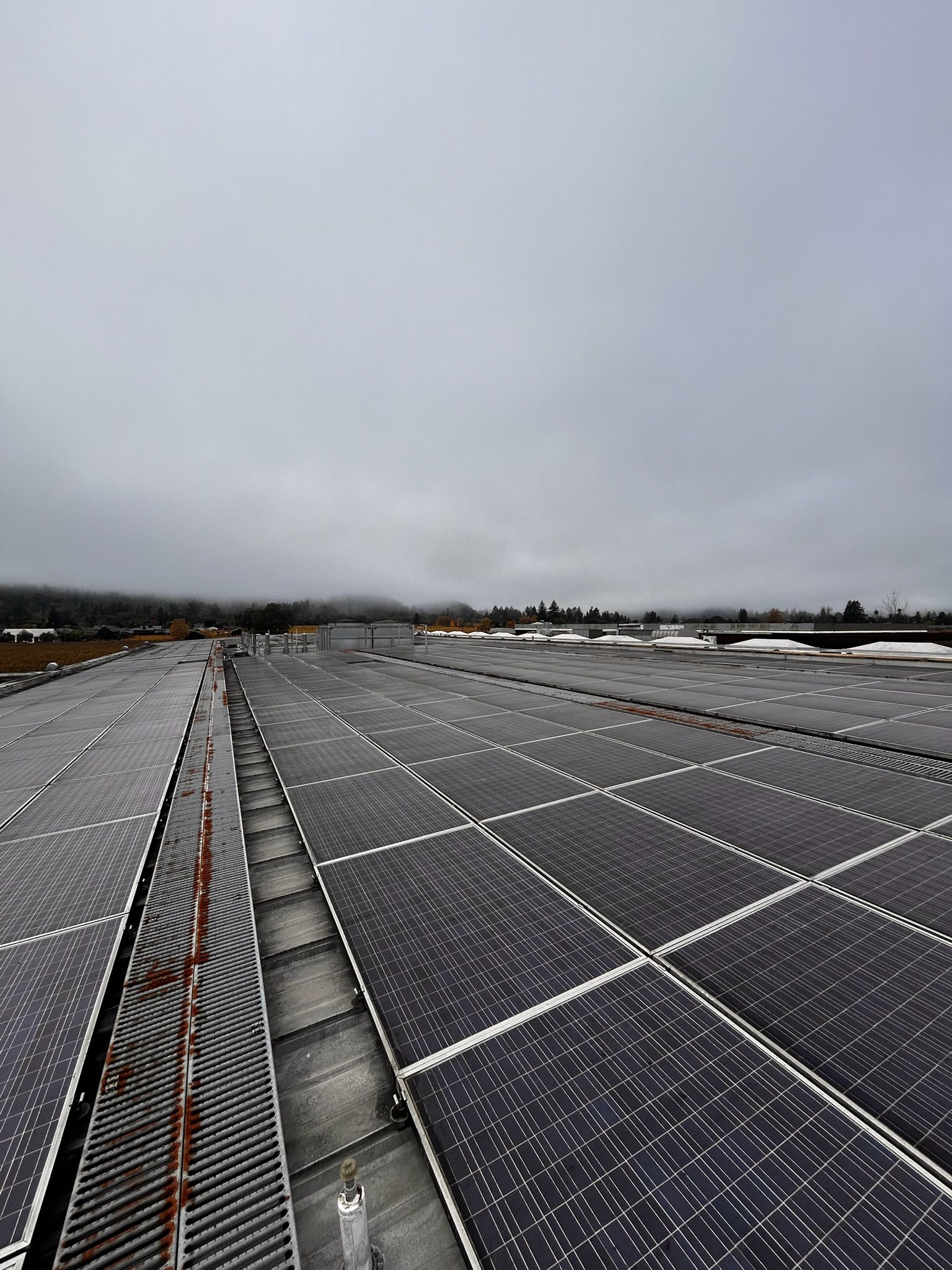 A wooden fence with a gate attached to it.