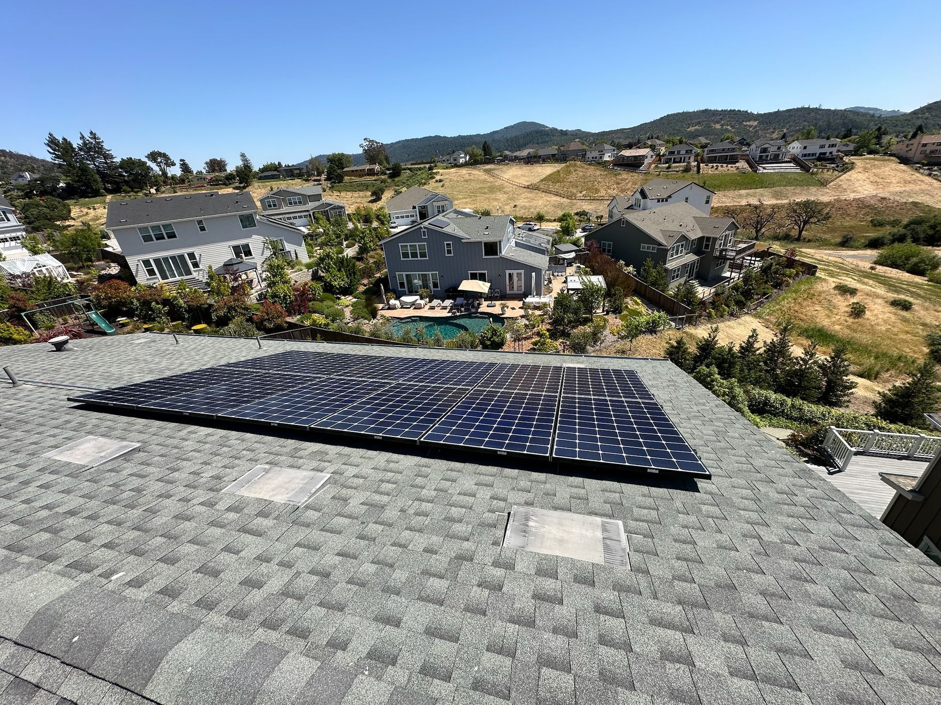 A wooden fence with a gate attached to it.