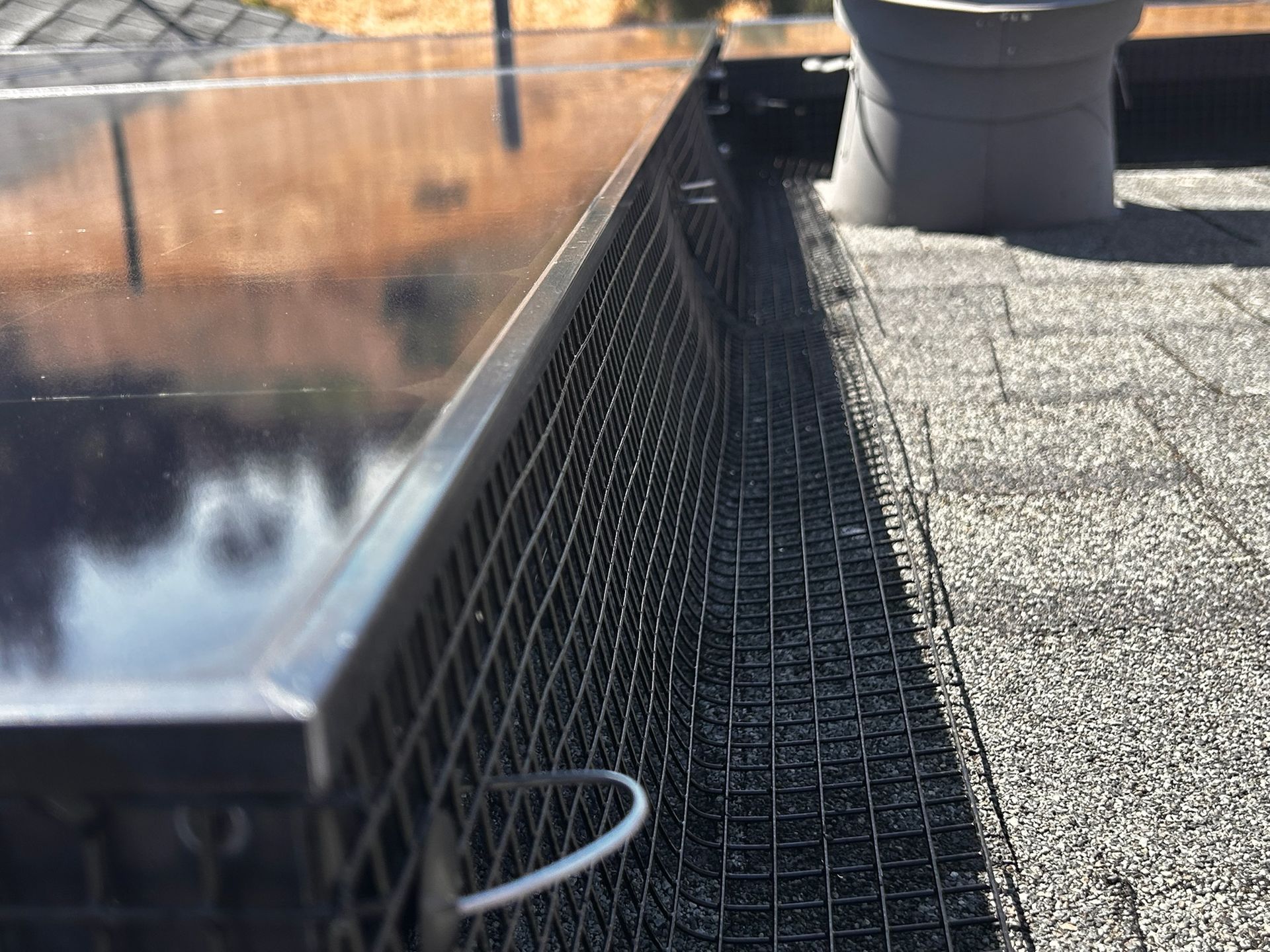Solar panel with installed wire mesh to prevent birds from nesting.