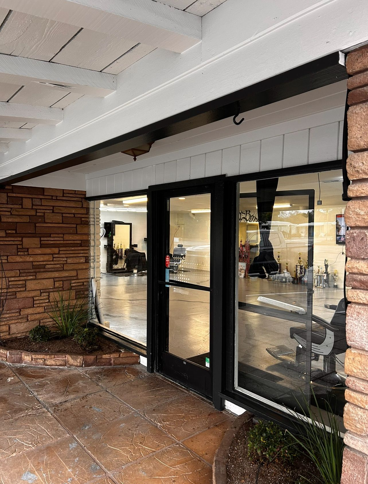 A wooden fence with a gate attached to it.
