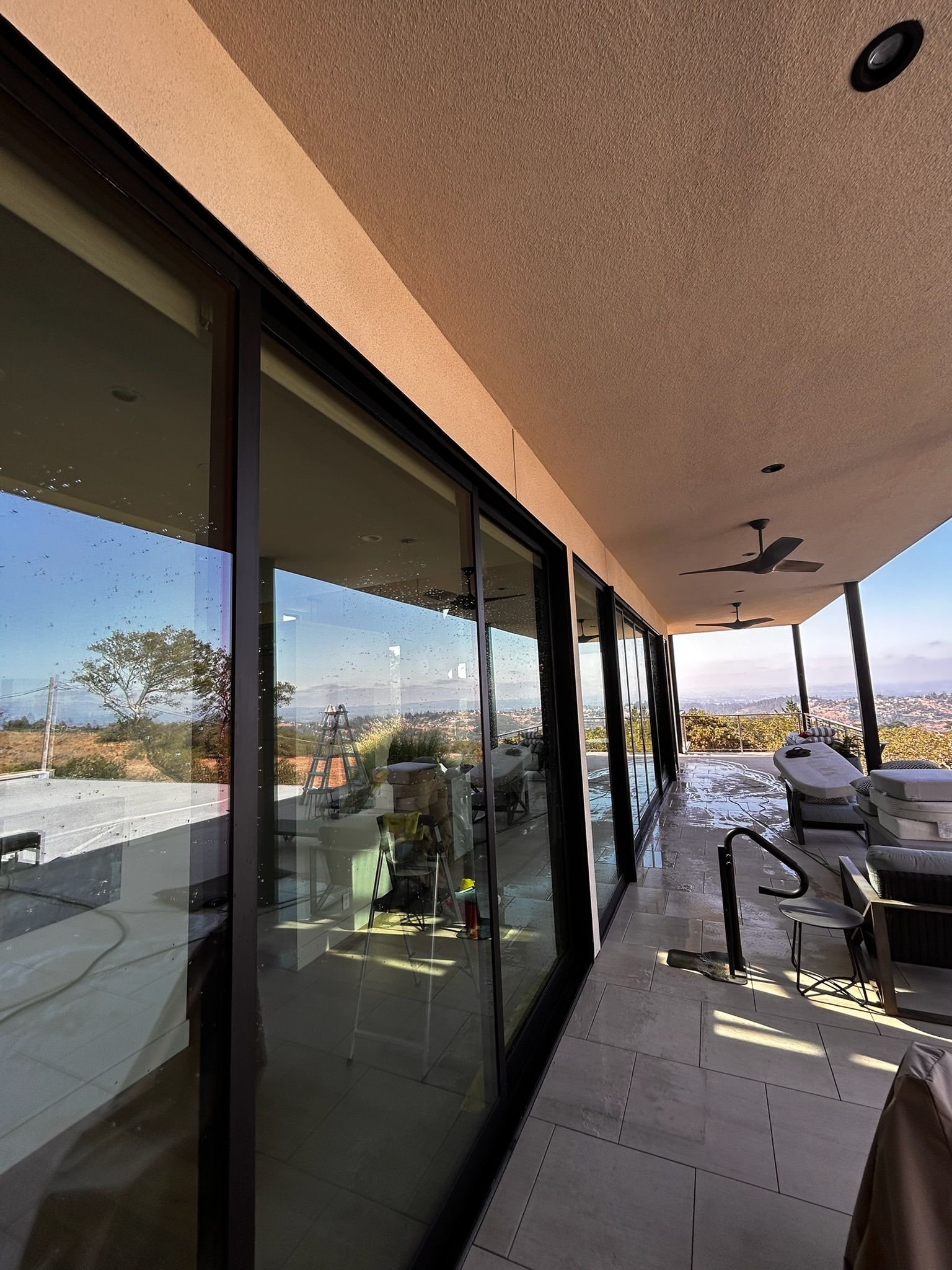 A wooden fence is sitting in the middle of a grassy field.