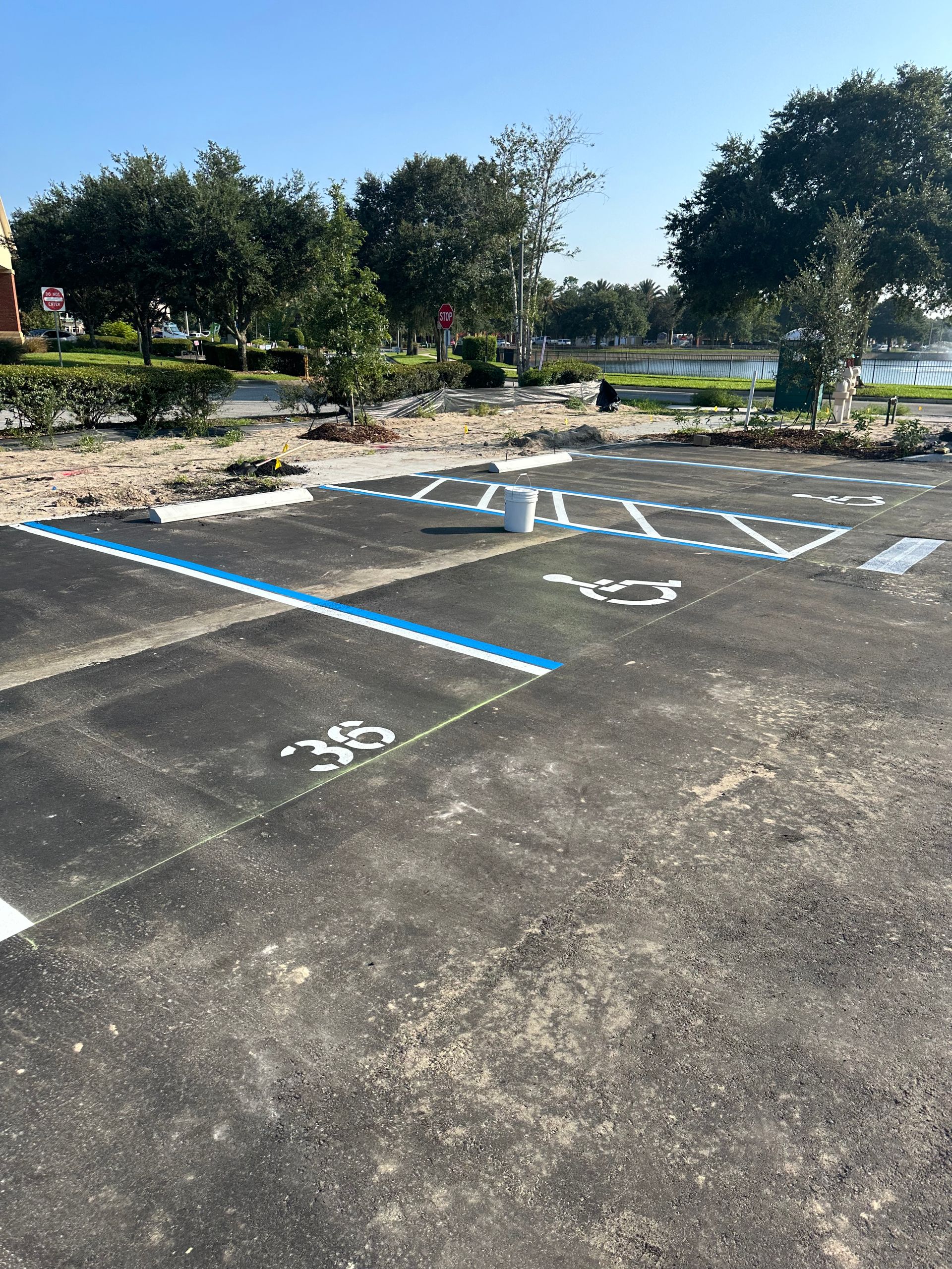 A handicapped parking spot in a parking lot