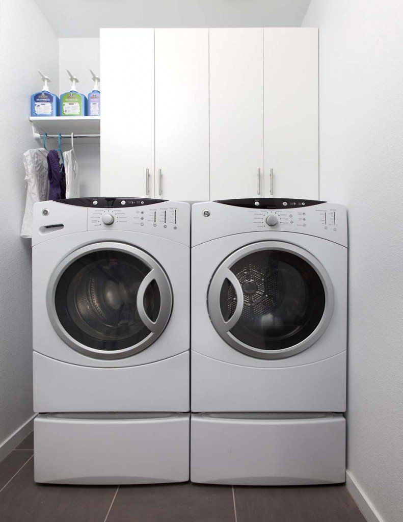 Custom laundry room upper storage system