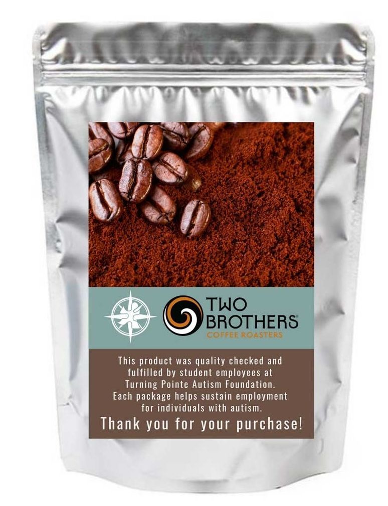 A silver bag of Two Brothers Coffee, with text noting it supports employment for individuals with autism.