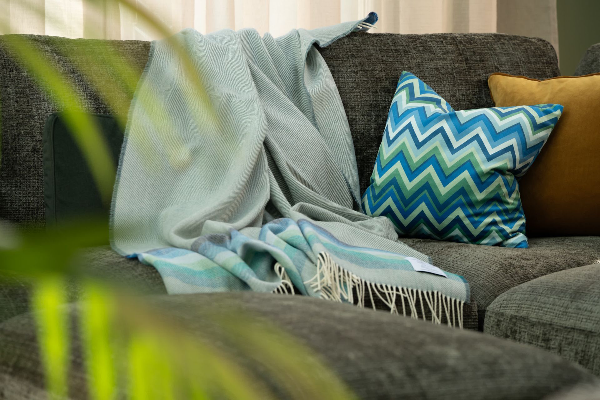 A cosy family room makeover featuring warm colours and rich textures for family gatherings.