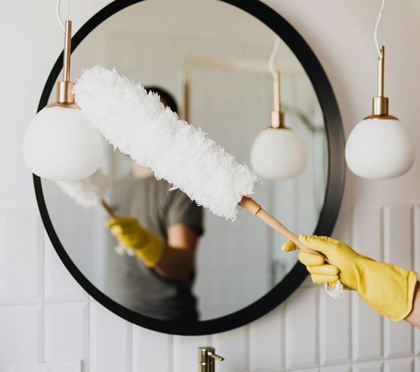 legit services cleaning a mirror
