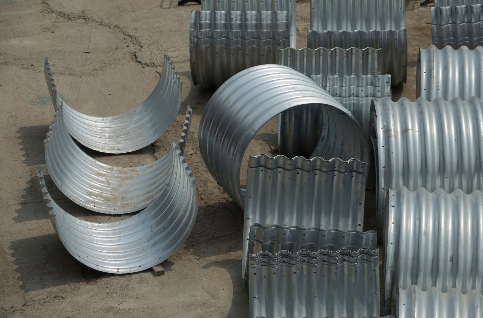 Rows of industrial machinery with yellow and orange components.