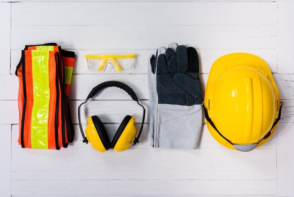 Safety Equipment On Wooden Background  — Wendy's Safety Services In Moulden, NT