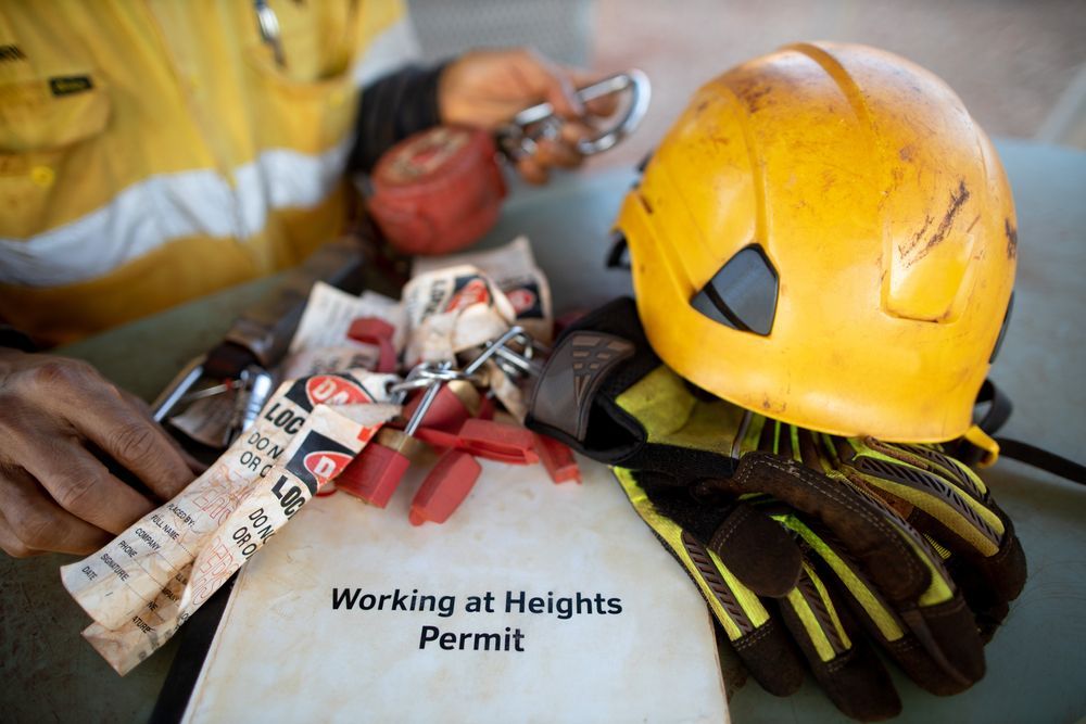 Yellow Hard Hat, Gloves, and Safety Equipment — Wendy's Safety Services In Adelaide River, NT
