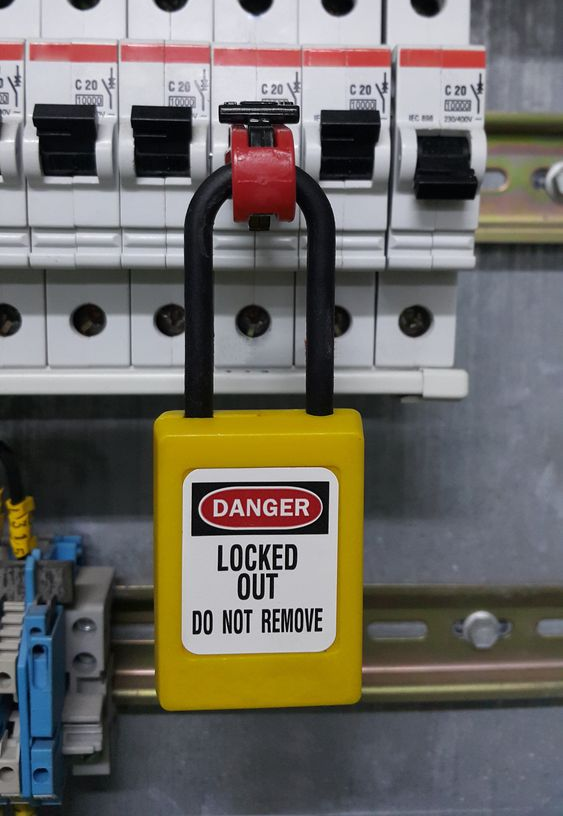 Yellow Padlock Securing Circuit Breakers — Wendy's Safety Services In Daly River, NT