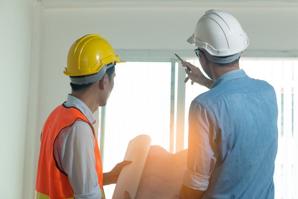 Safety Professionals Examine The Interior Of The House  — Wendy's Safety Services In Moulden, NT