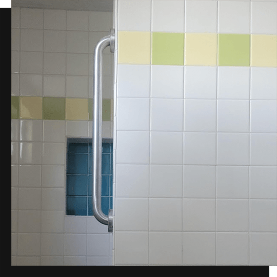 square tiles on bathroom wall