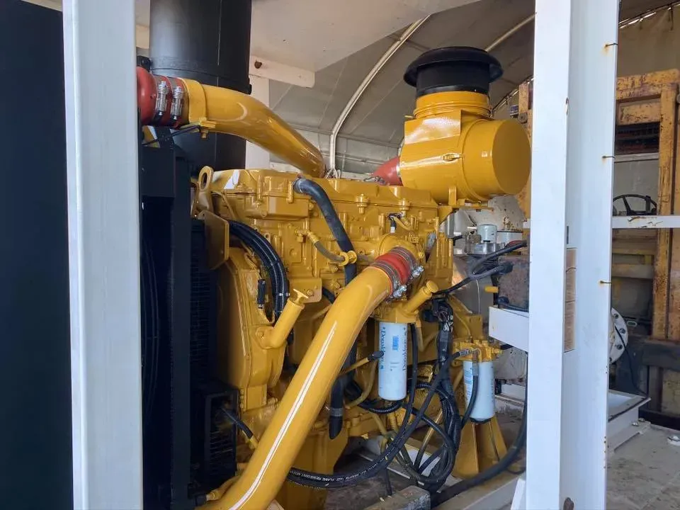 Yellow Caterpillar Engine Inside a White Metal Frame — All Blast and Paint in Bakers Creek, QLD
