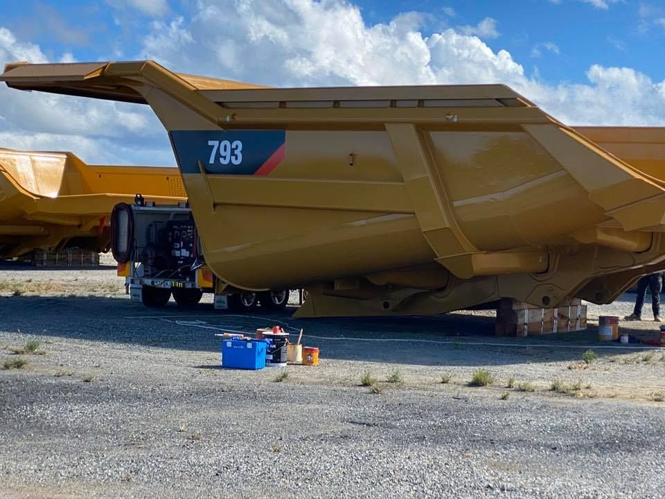 Yellow Caterpillar 793 Dump Truck Bed — All Blast and Paint in Bakers Creek, QLD