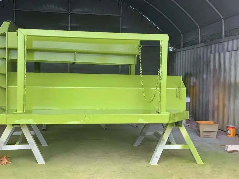 Green Metal Structure on Sawhorses in a Workshop — All Blast and Paint in Bakers Creek, QLD