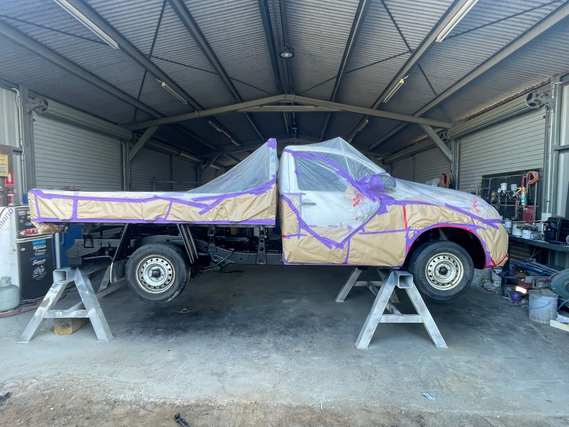 White Pickup Truck Masked for Painting — All Blast and Paint in Paget, QLD
