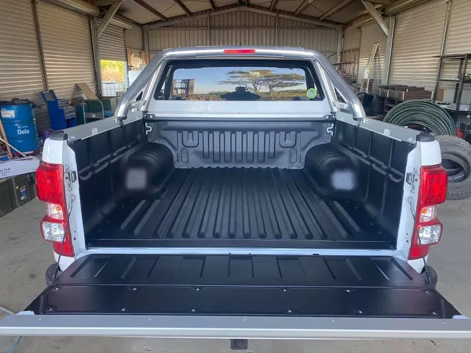 White Pickup Truck Bed With Black Liner — All Blast and Paint in Bakers Creek, QLD