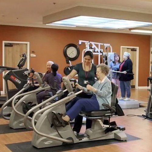 Aldersgate Village woman on treadmill in recovery center