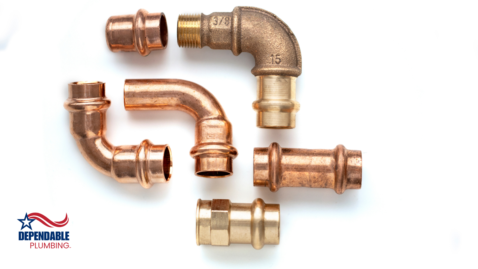 A bunch of plumbing tools and pipes on a white background