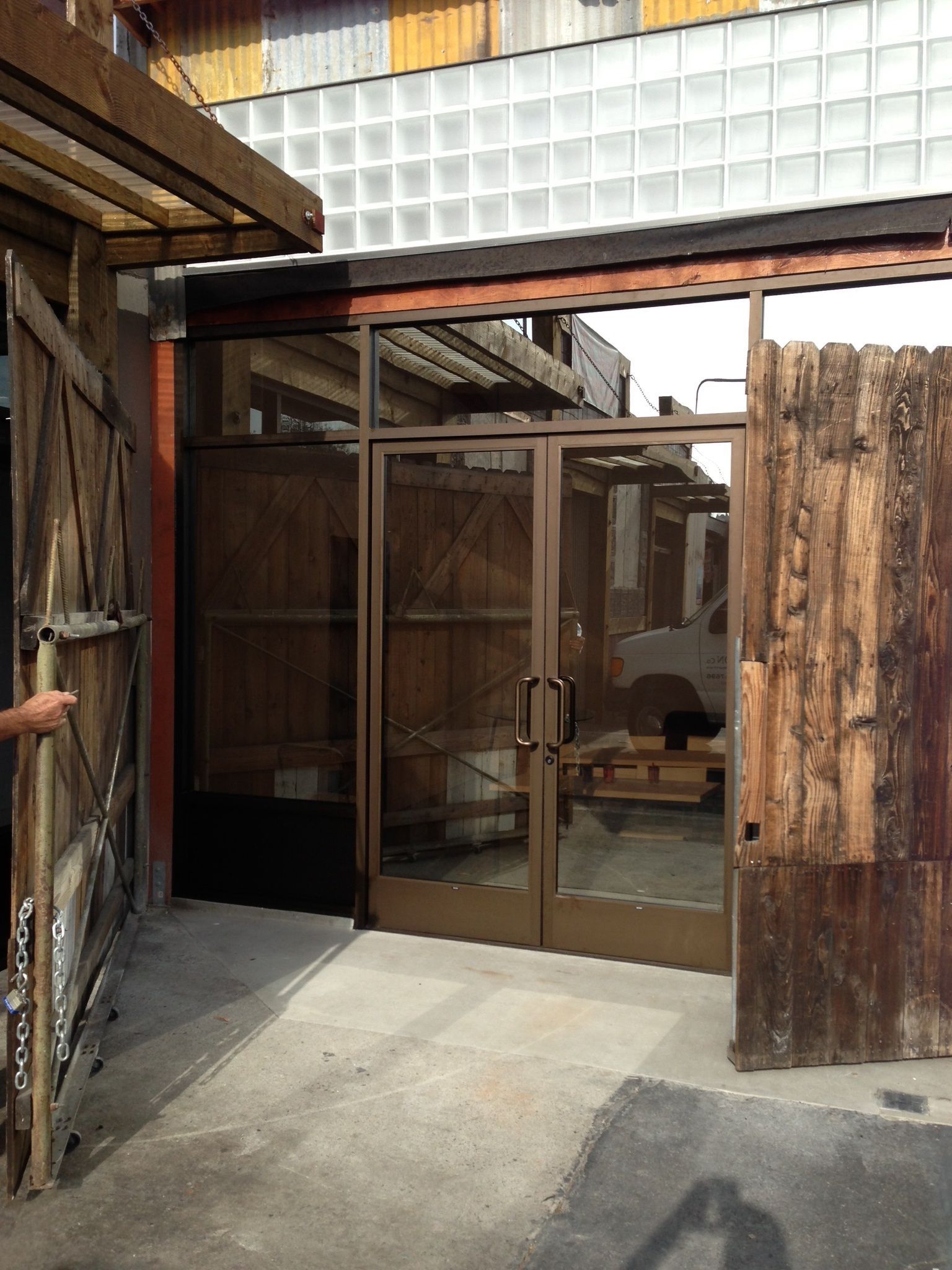 Storefront -dark bronze anodized aluminum with bronze reflective glass