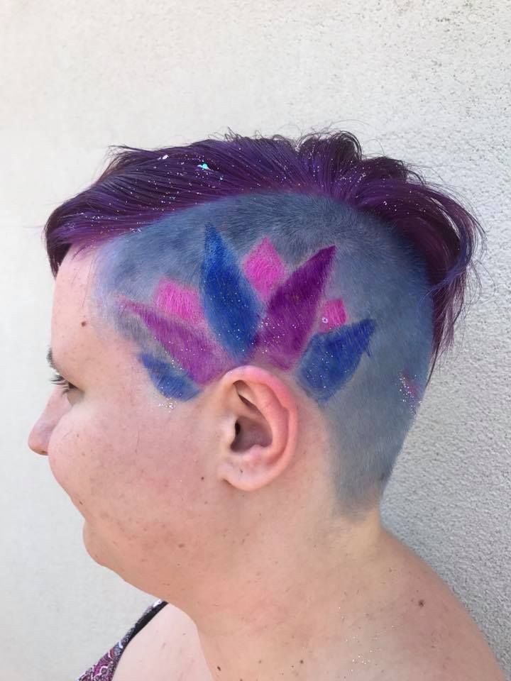 A Woman with Purple and Blue Hair Has a Tattoo on Her Head — Hair It Is In Balgownie, NSW