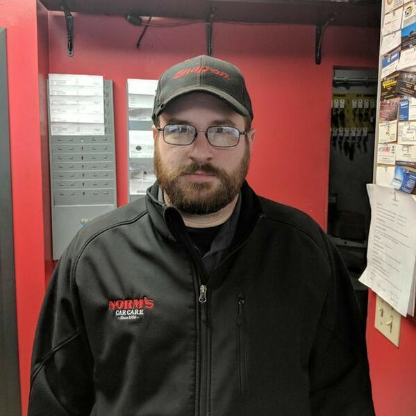Nick Auto Technician At Front Desk In Lincoln, NE Shop | Norm's Car Care