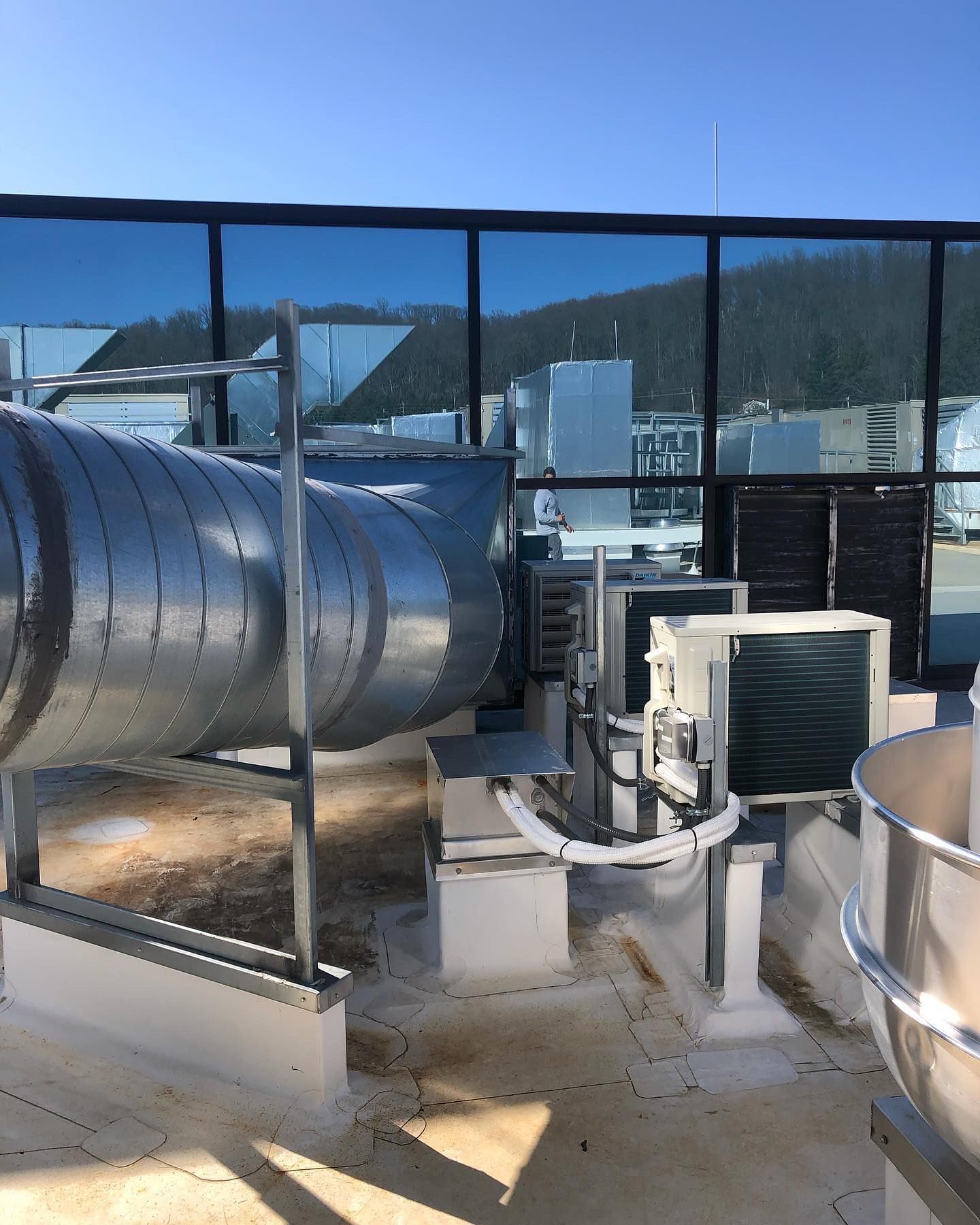 A building with a lot of pipes going through it