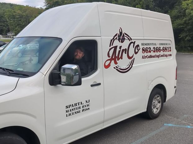 A white van with the word air on it