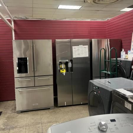 An efficient stainless steel ice machine featuring a sleek design, capable of producing large quantities of ice tubes.