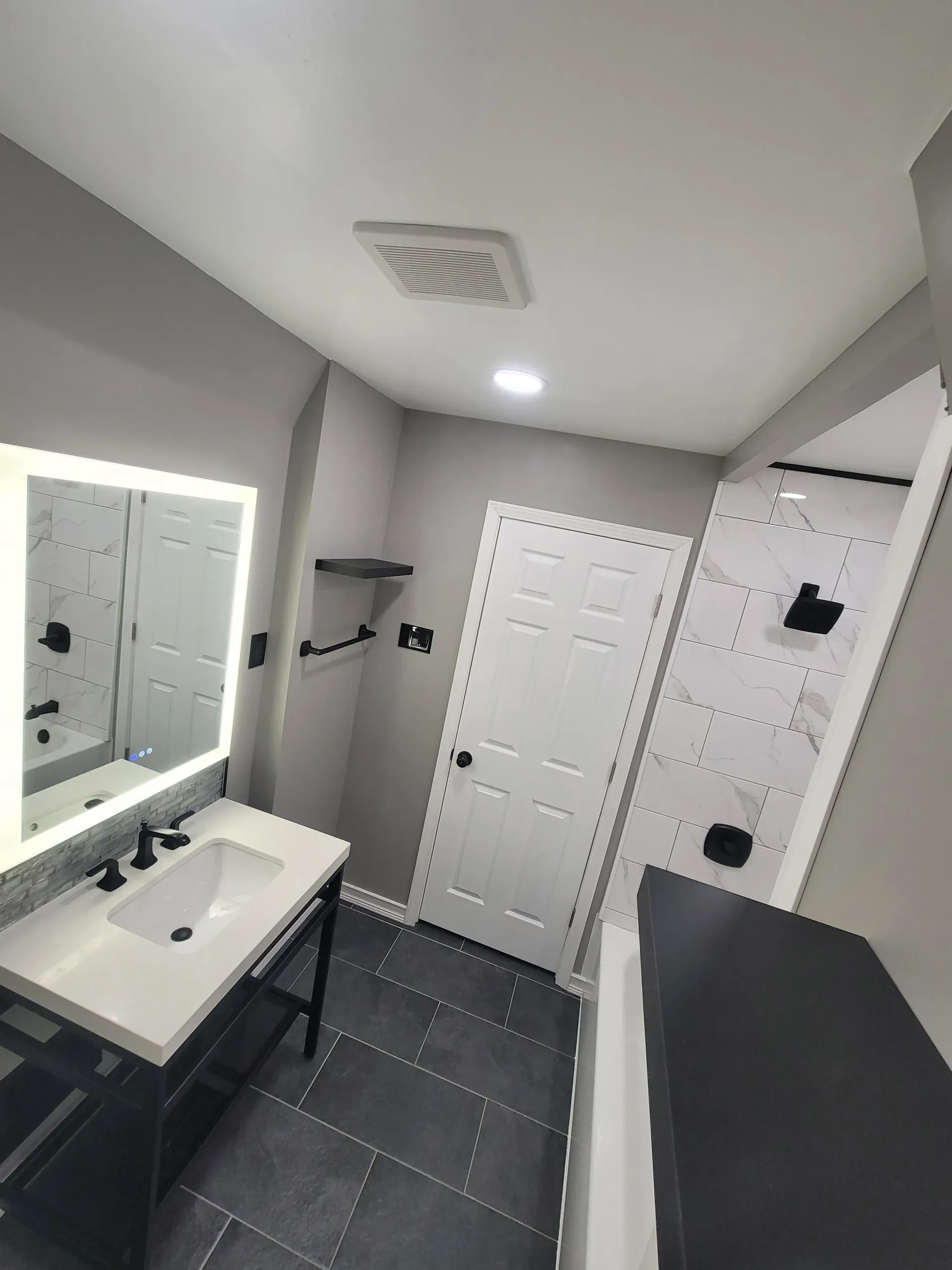 Modern bathroom with a white vanity