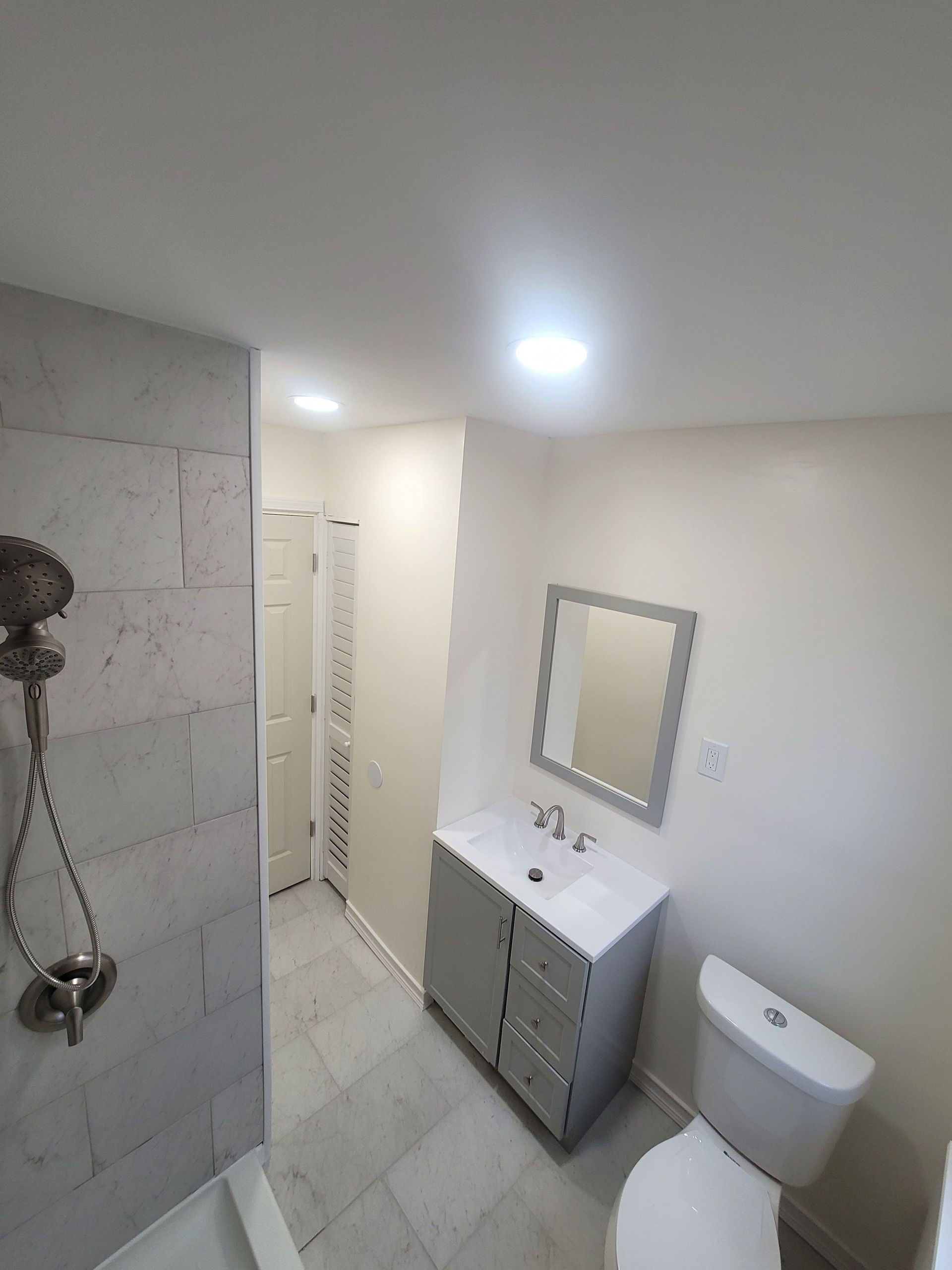 Bathroom with gray vanity