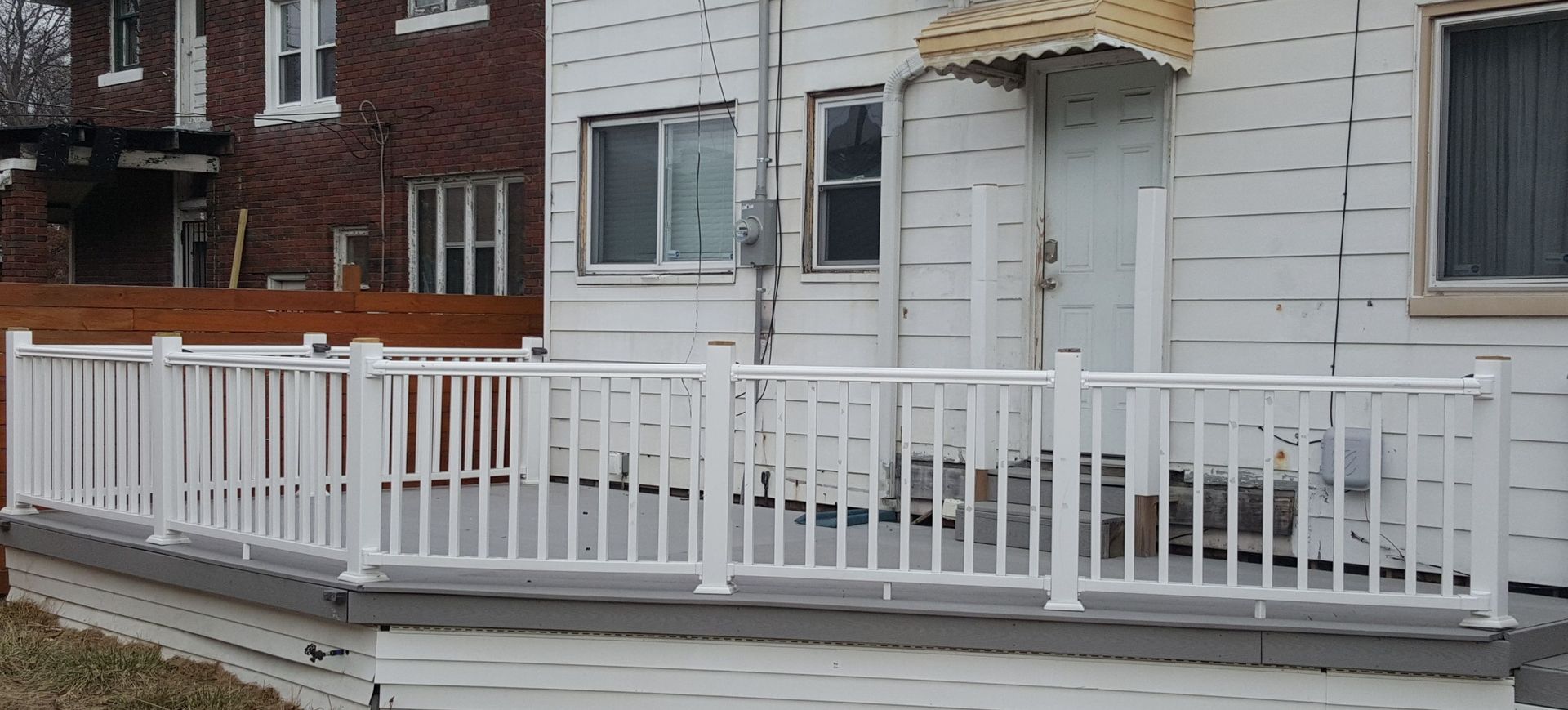 White deck with a white railing
