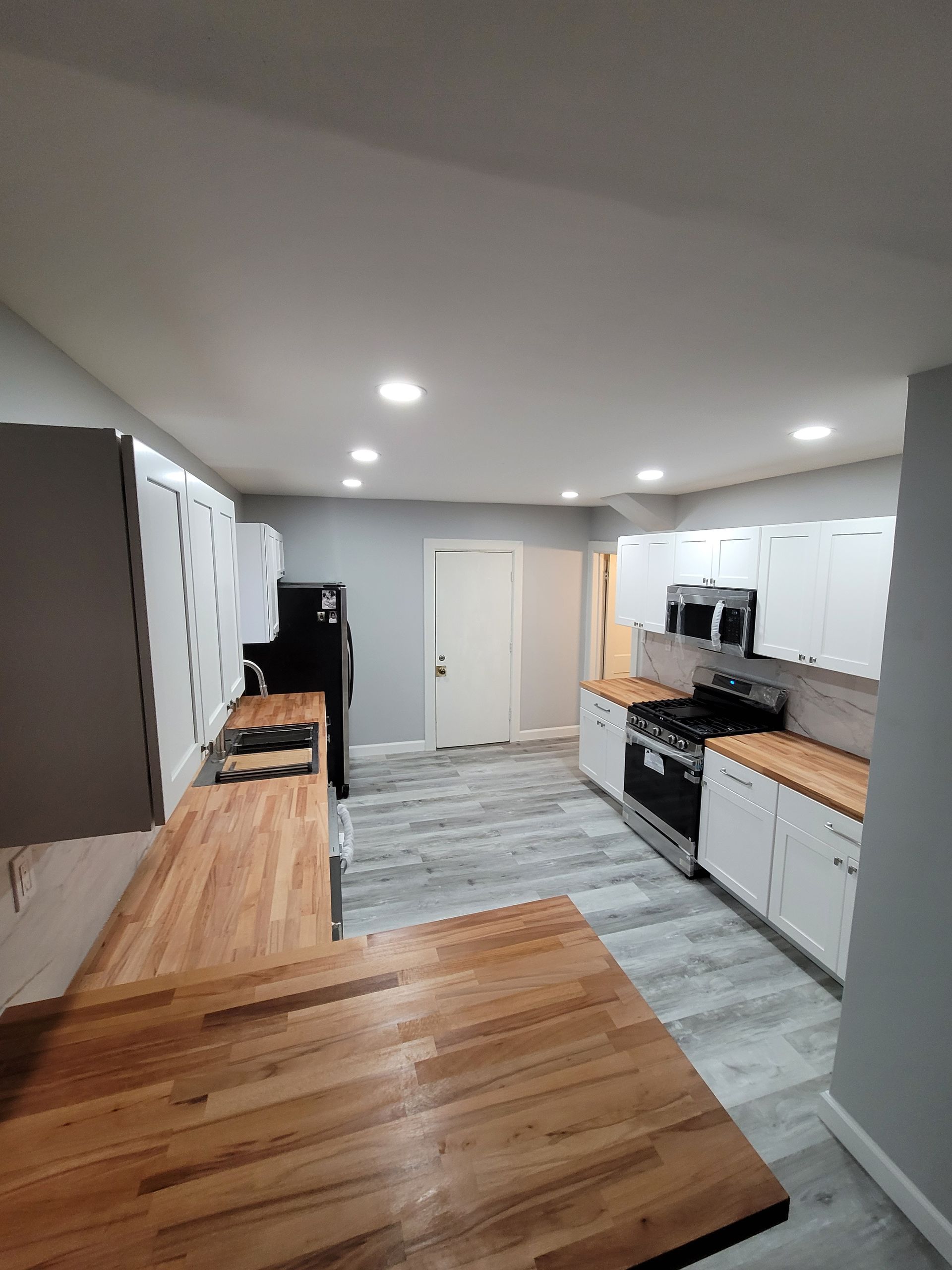 Modern kitchen with light gray walls