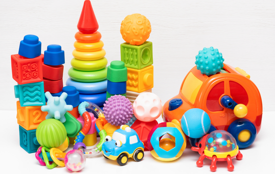 There are many different types of toys on the table.