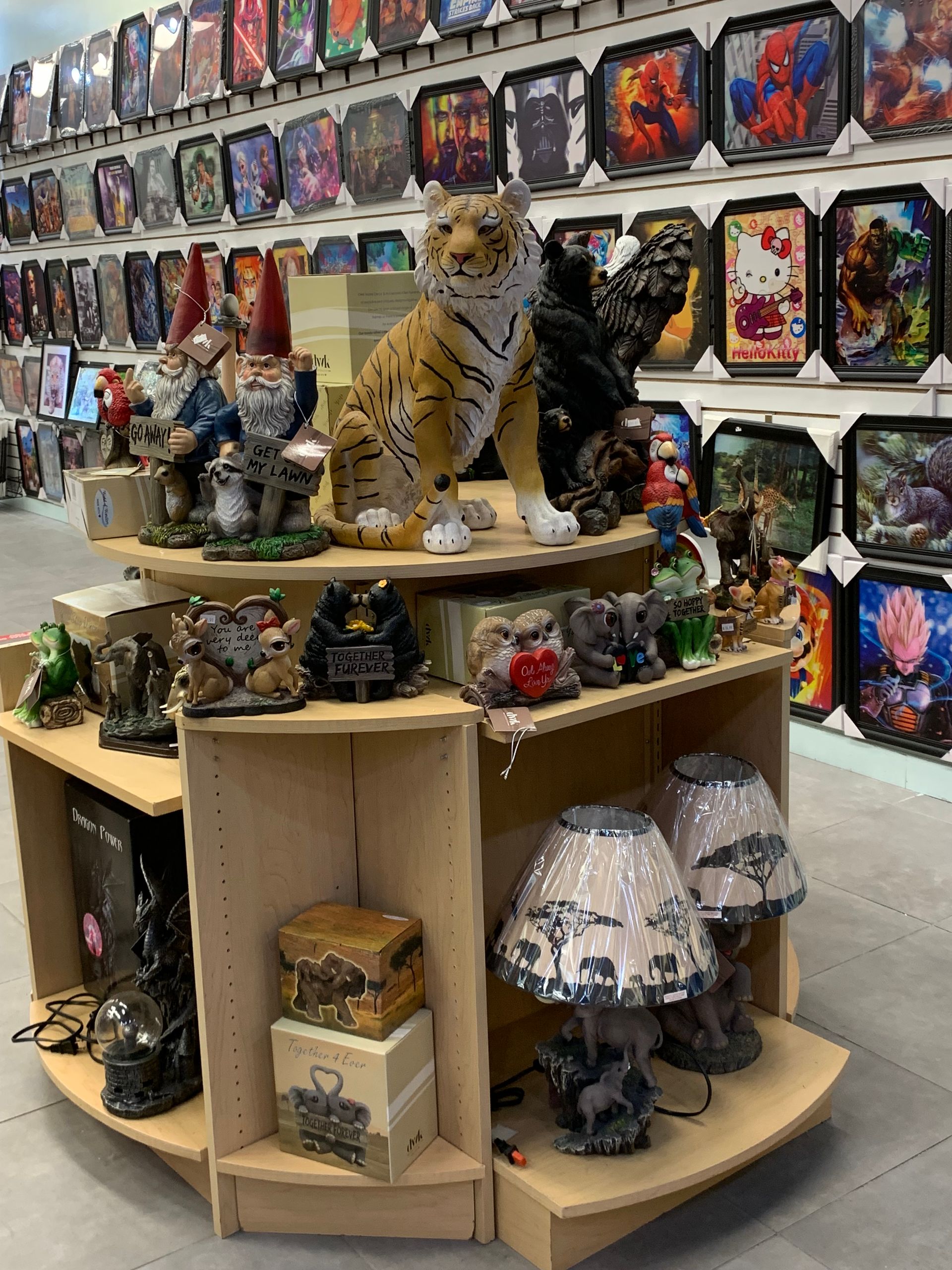 A display of stuffed animals and lamps in a store