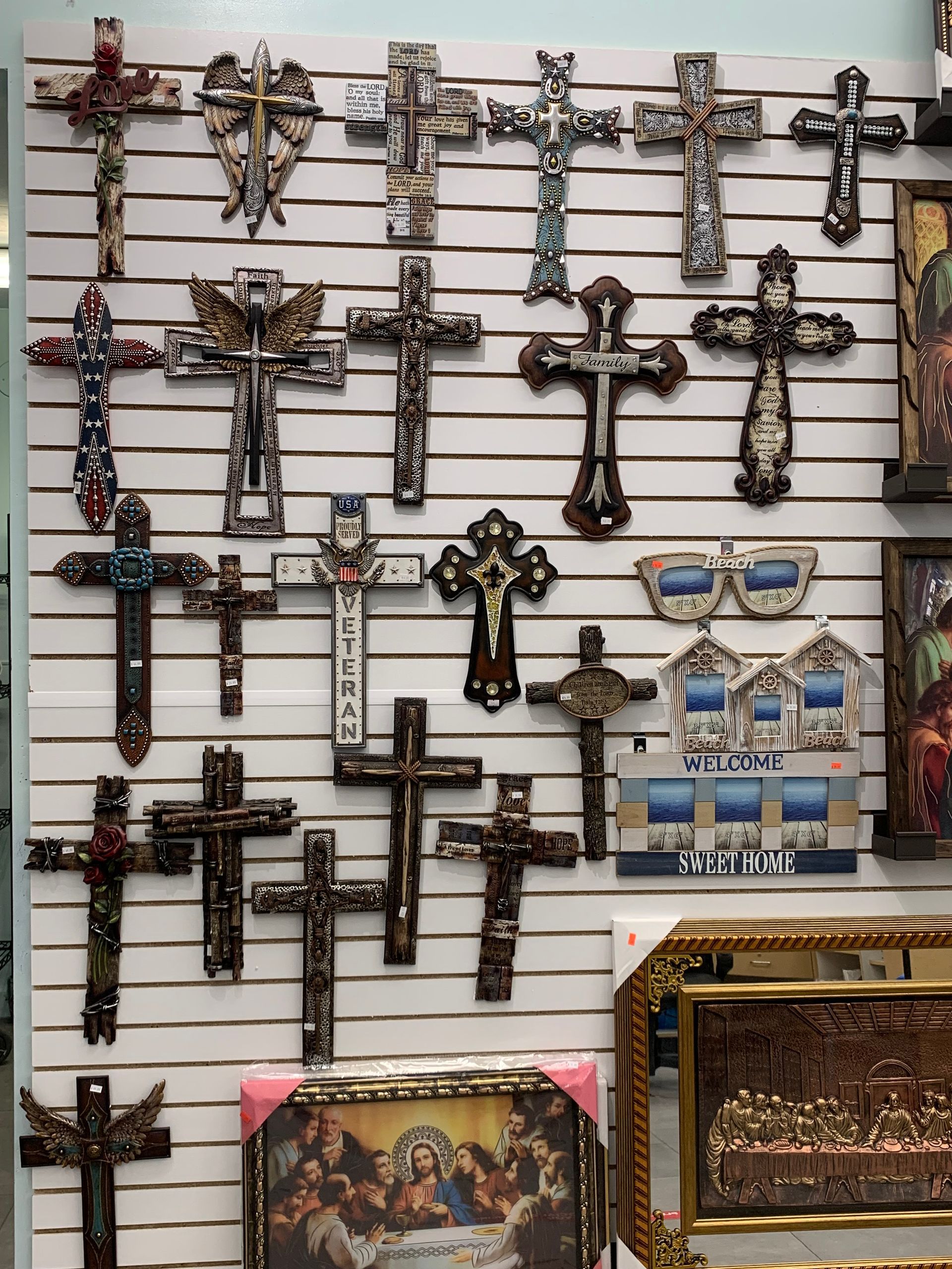 A wall with a lot of crosses on it