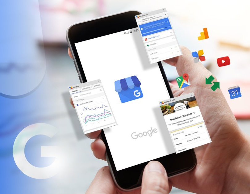 Person holding smartphone displaying Google Business Profile features.