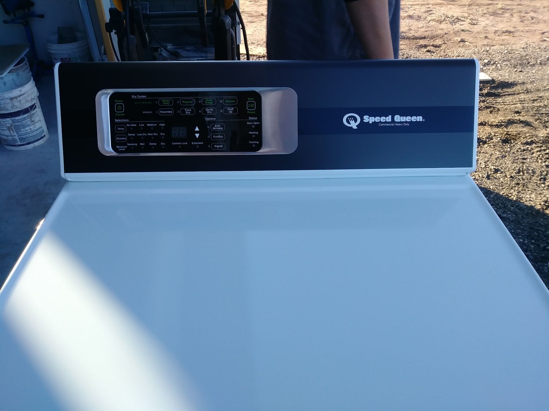 White Speed Queen dryer with a black control panel.