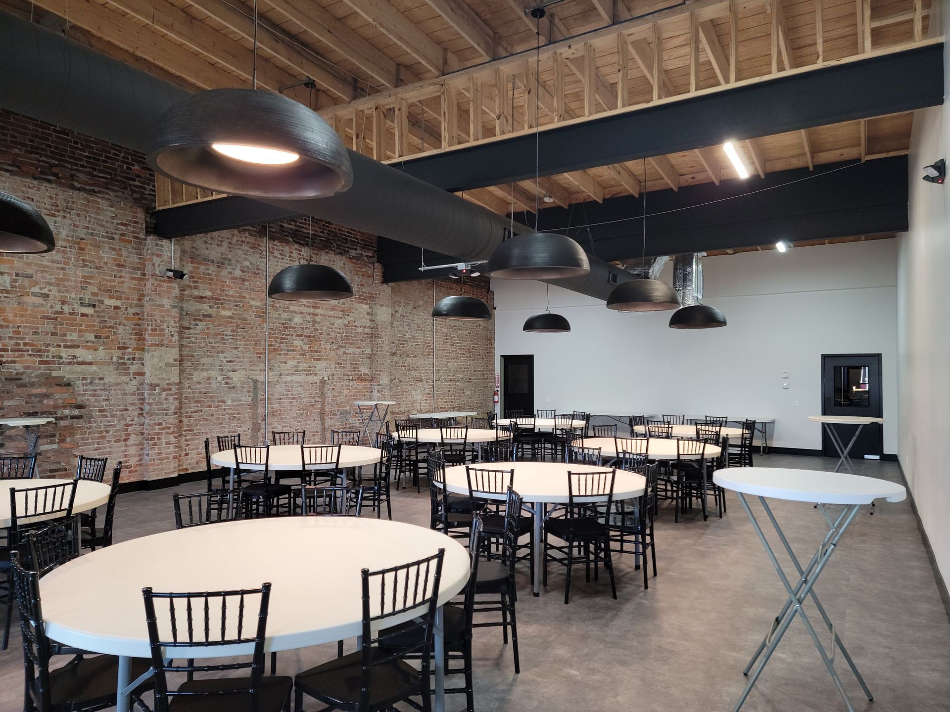 Table and chairs setup at The Rochester